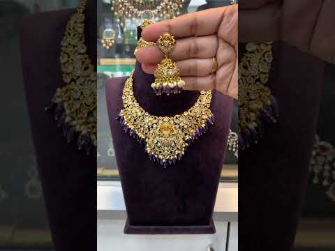 Beautiful neck chocker with god Laxmi Devi motive and purple beads
